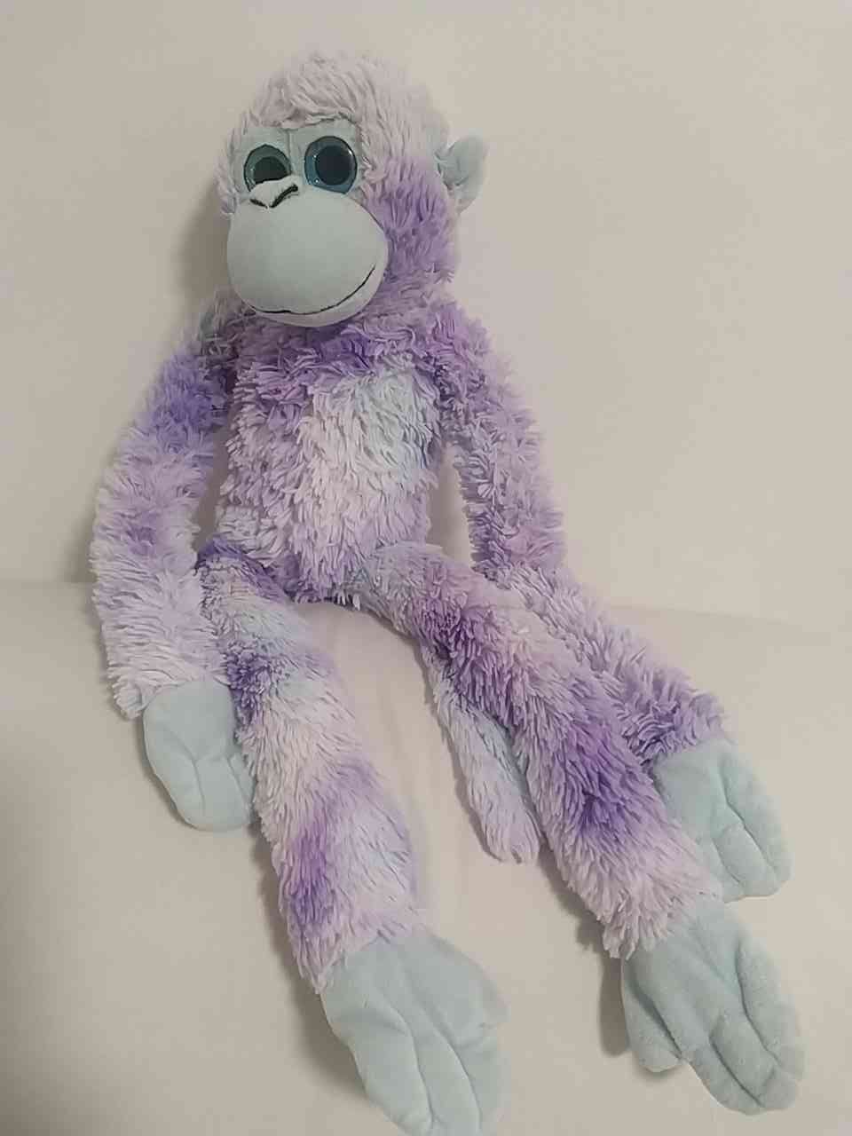 Purple tie-dye monkey plush