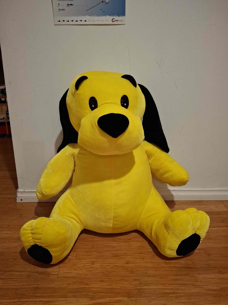 Large yellow plush dog
